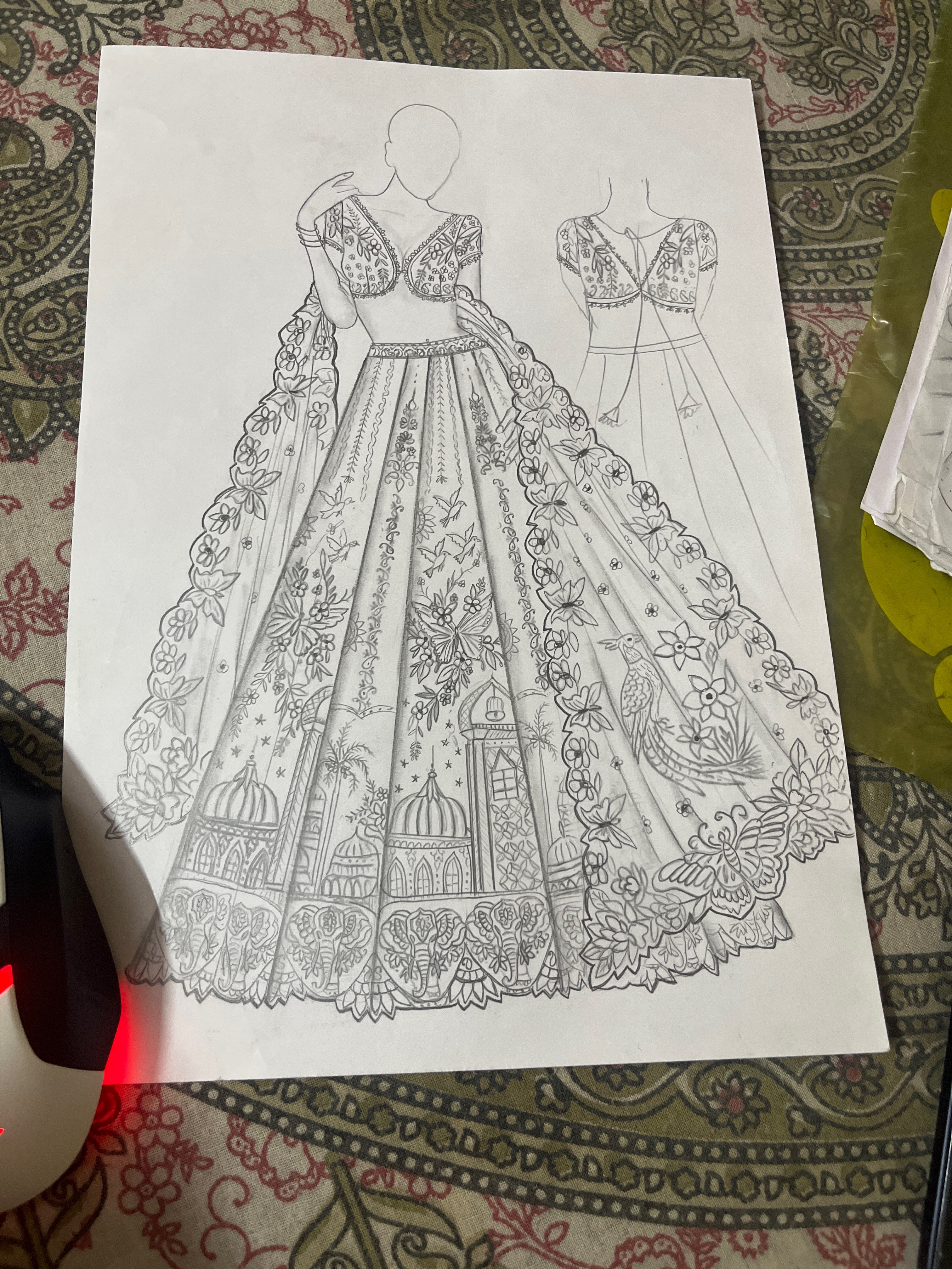 Hand-drawn heritage bridal lehenga development sketch